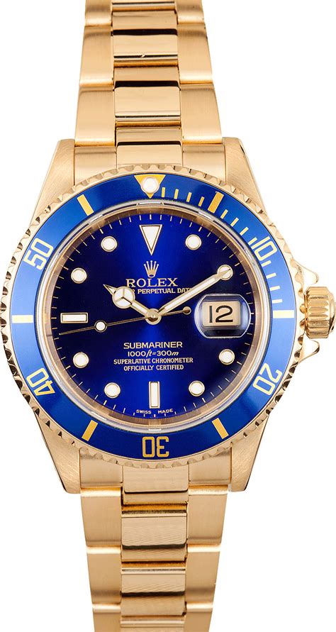 rolex 18k gold submariner.